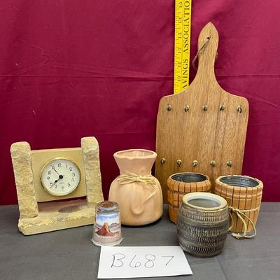 Limestone clock,painted shot glass, pottery vase