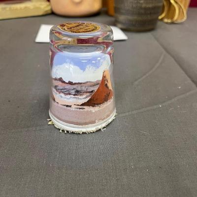 Limestone clock,painted shot glass, pottery vase