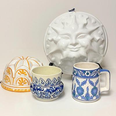 LOT 169  GROUP OF CERAMIC MOLDS CUP & MUG SMILING SUN BASSANO ITALY