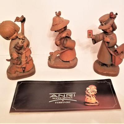 Lot #93  Lot of 3 ANRI Wood carved figures with Book