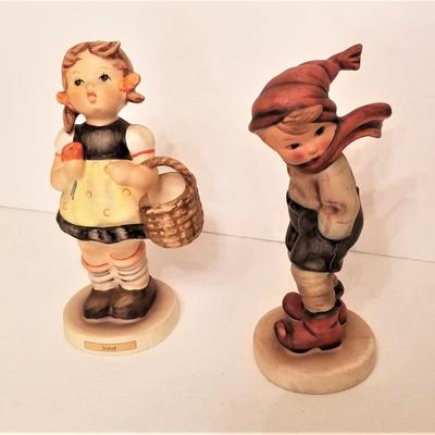 Lot #104  Pair of Hummel Figurines - "March Wind" and "Sister"