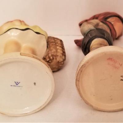 Lot #104  Pair of Hummel Figurines - "March Wind" and "Sister"