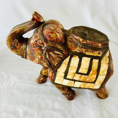 Four Wooden Carved Elephants
