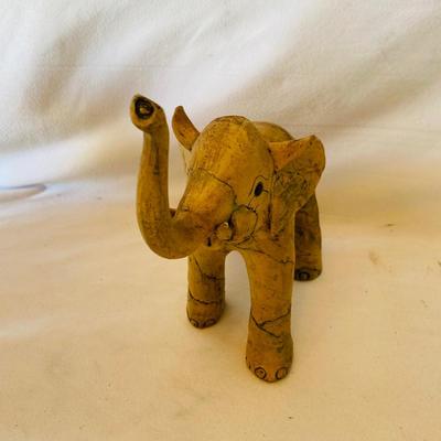 Four Wooden Carved Elephants