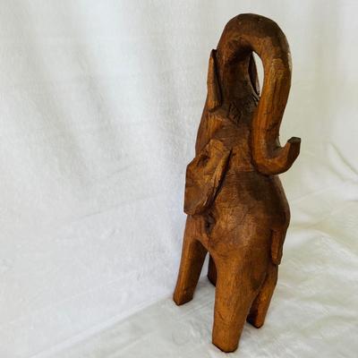 Four Wooden Carved Elephants