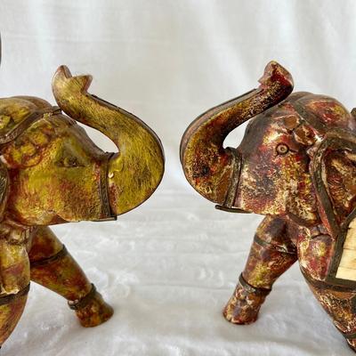 Four Wooden Carved Elephants