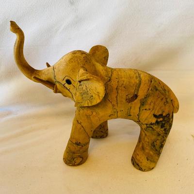 Four Wooden Carved Elephants