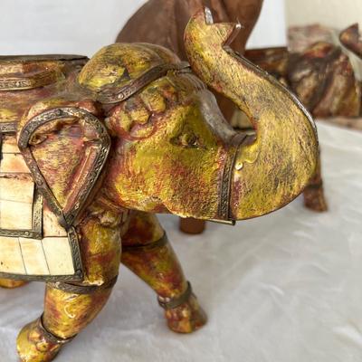 Four Wooden Carved Elephants