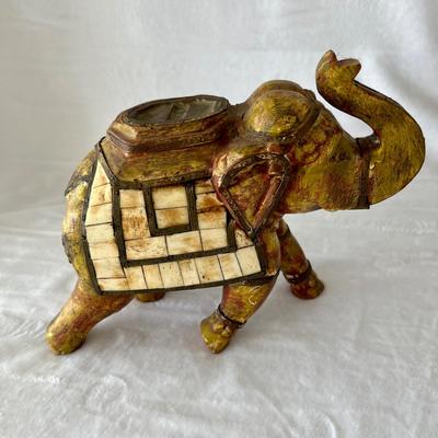 Four Wooden Carved Elephants