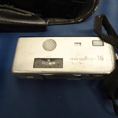 LOT 21 MISC ITEMS CAMERAS, DUMB BELLS AND DISNEY DECORATION
