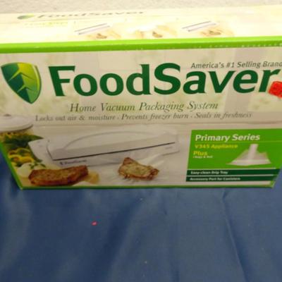 LOT 26. FOOD SAVER MACHINE