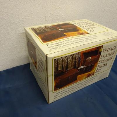 LOT 29 LEATHER MINI STEAMER TRUNK SET