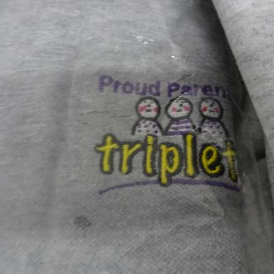 LOT 33. TRIPLET RELATED CLOTHING AND ITEMS
