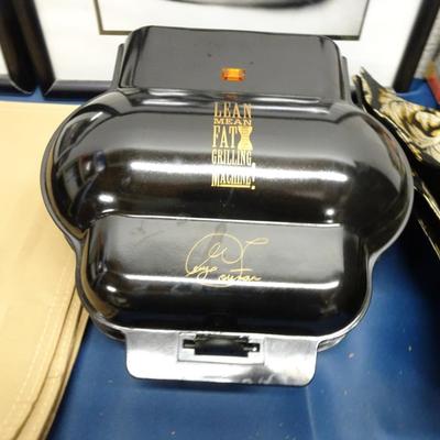 LOT 35. FRAMED PHOT0S, HOME DECOR AND FOREMAN GRILL