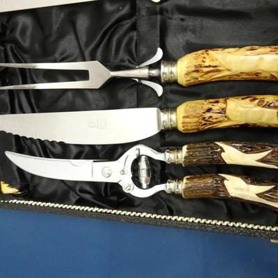 LOT 37. OTHELLO GERMAN MADE CARVING SET