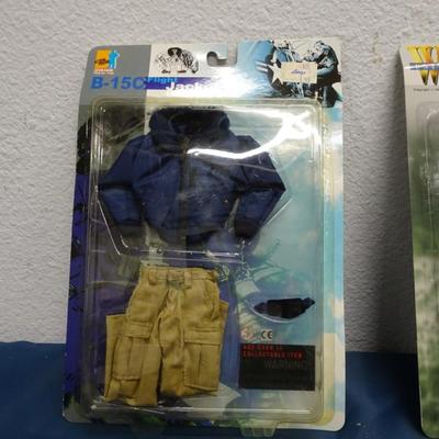 LOT 51 DOLL MILITARY UNIFORMS