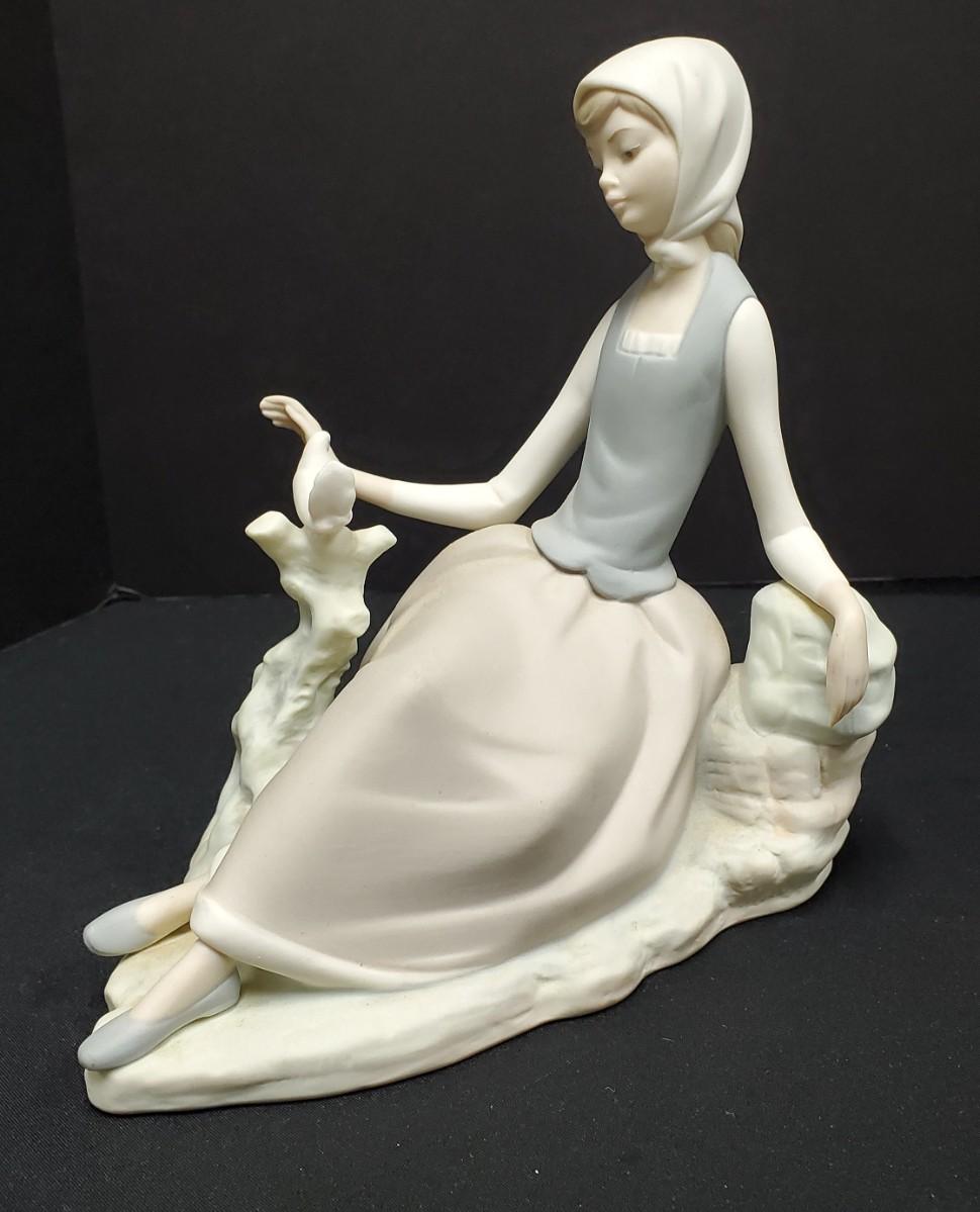 Lladro-Shepherdess with Dove | EstateSales.org