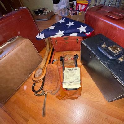 2B24-Vintage suitcases, American flag, canes, etc.
