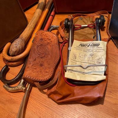2B24-Vintage suitcases, American flag, canes, etc.