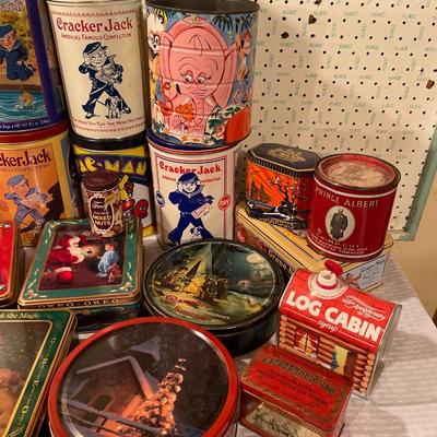 D11-Metal tin lot plus a prank tin