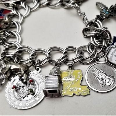 Lot #122  Fantastic Sterling Silver Charm Bracelet - loaded with charms