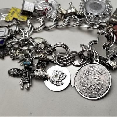Lot #122  Fantastic Sterling Silver Charm Bracelet - loaded with charms