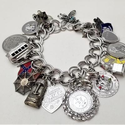 Lot #122  Fantastic Sterling Silver Charm Bracelet - loaded with charms