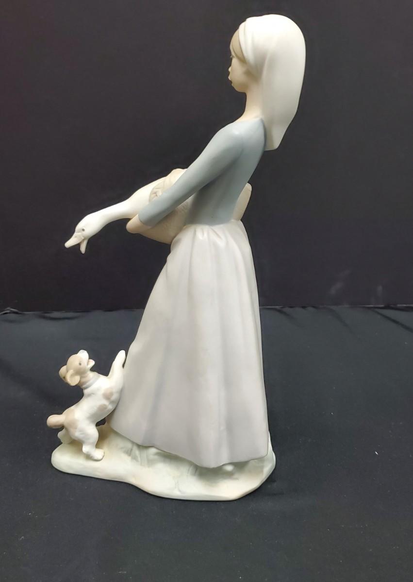 Lladro - Girl with Goose and Dog | EstateSales.org