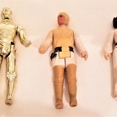 Lot #131  Lot of Star Wars Trading Cards - 1st Series, 1977 - 2 stickers, 3 action figures
