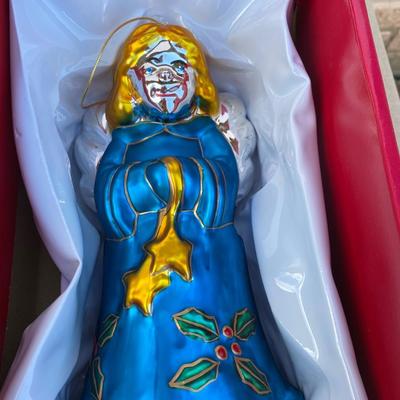 Assortment of angels and a Santa windup music box