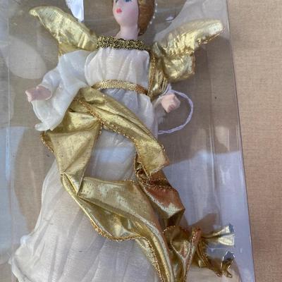 Assortment of angels and a Santa windup music box