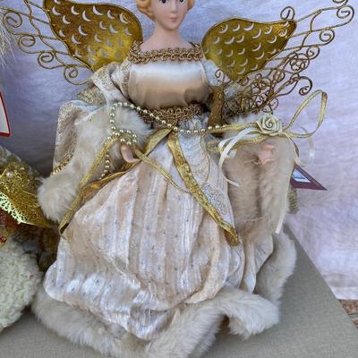 Assortment of angels and a Santa windup music box