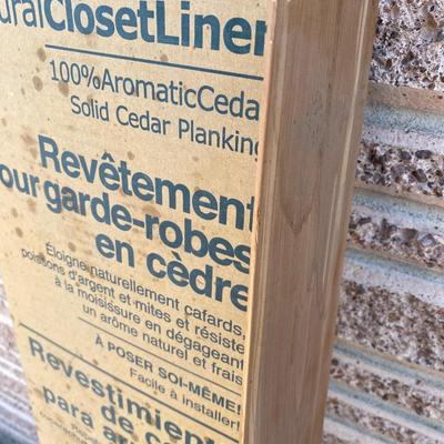 Partial box of cedar tongue and groove closet liner
