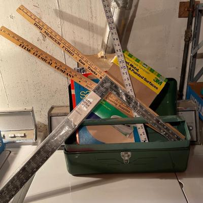 W12-Toolbox with sandpaper, yardsticks and square