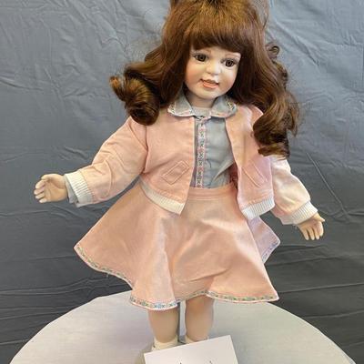 Brown Hair Porcelain Doll in Peach Dress