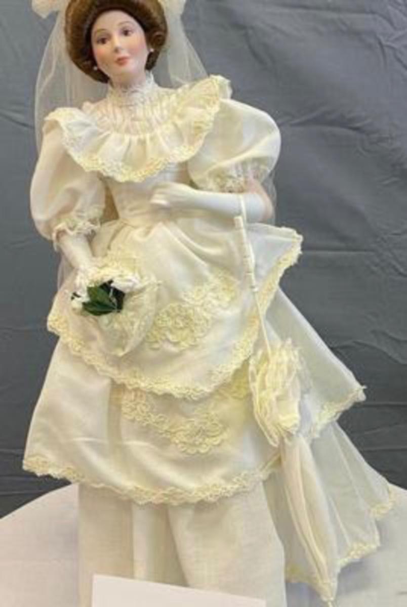 Porcelain Wedding Doll with Umbrella | EstateSales.org