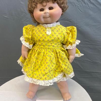 Chubby Cheeks Porcelain Doll