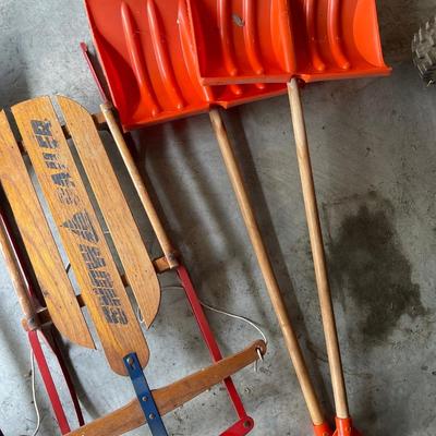 G25-Wooden sled and four shovels