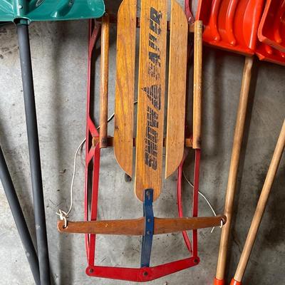 G25-Wooden sled and four shovels