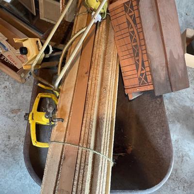 G26-Wheelbarrow, stakes, sprinklers, bird feeder