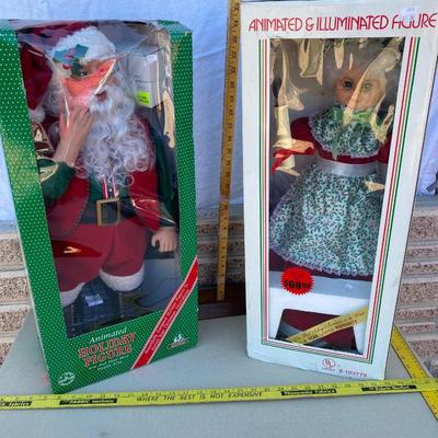 Mr. and Mrs. Santa Clause animatronic dolls
