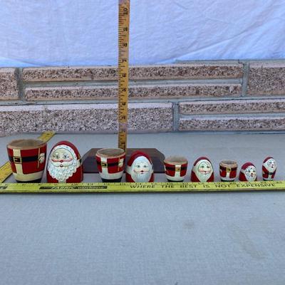 Wooden nesting Santa dolls