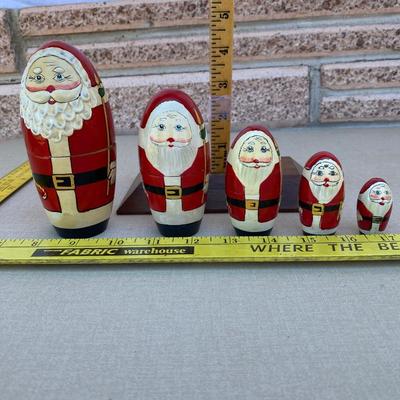 Wooden nesting Santa dolls