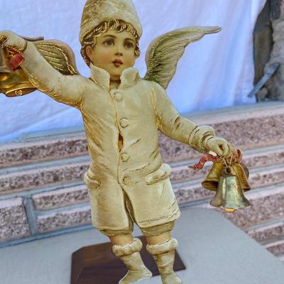 Vintage looking cardboard in brass bells angel ornament