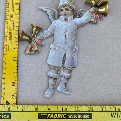 Vintage looking cardboard in brass bells angel ornament