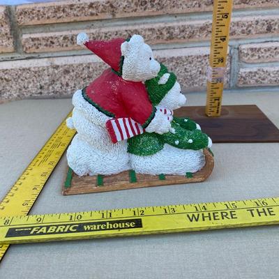 Resin polar bear on sled figurine
