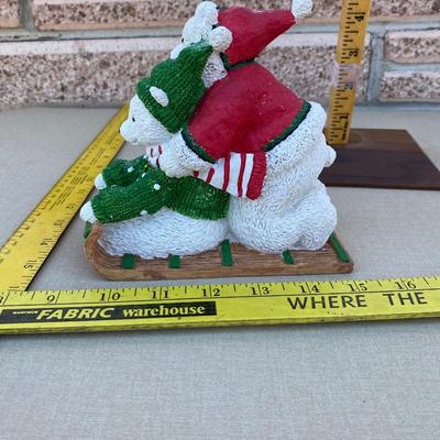 Resin polar bear on sled figurine