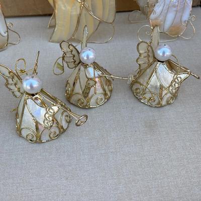 Set of eight assorted Angels