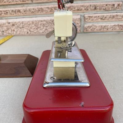 Vintage plastic and metal jet Sew-O-Magic toy sewing machine