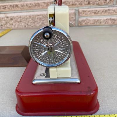Vintage plastic and metal jet Sew-O-Magic toy sewing machine
